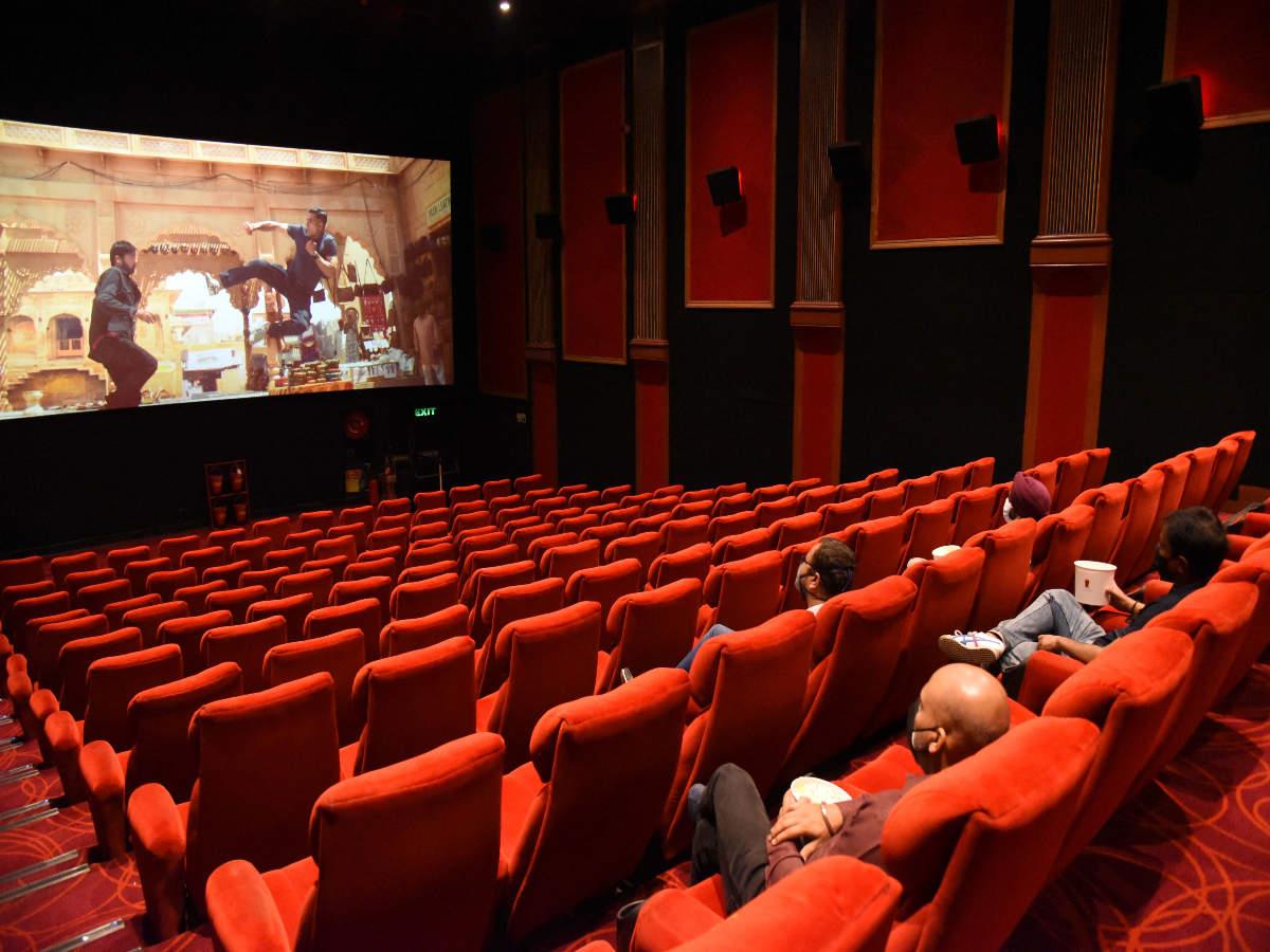 Moviegoer checking cinema listings and show times before watching a film